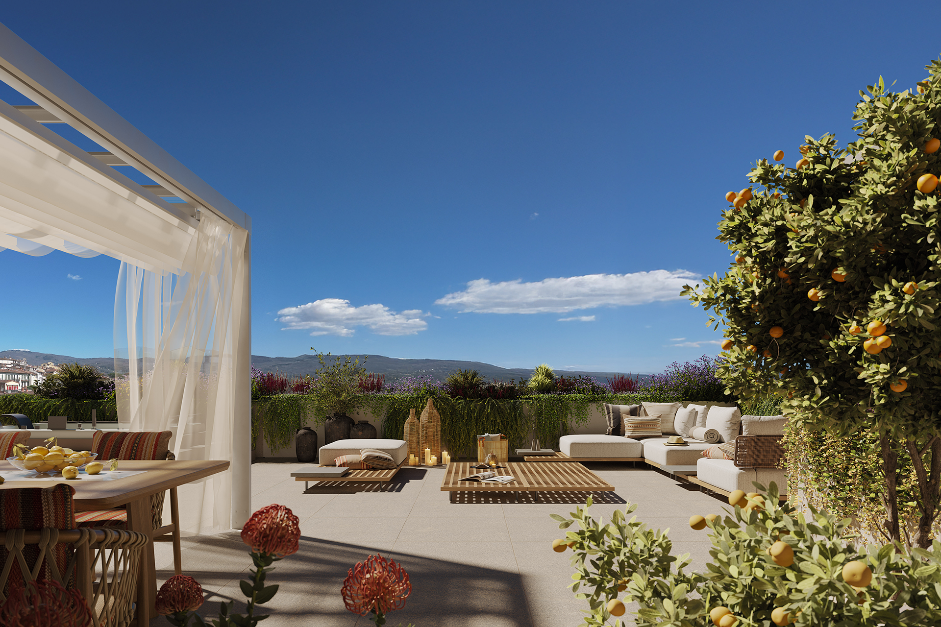 Terrazza di Residenza Il Molino a Lucca con salotto all’aperto, pergola, piante di agrumi e vista sulle colline toscane.